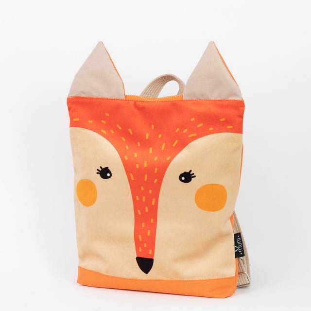 7. Studio shot of Muni kids fox backpack, angled view highlighting velvet fabric and waterproof bottom