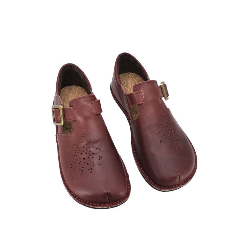1. Omaking Kuuda Shoes in Bordoo, featuring wide toe area and adjustable buckle straps, shown in studio setting