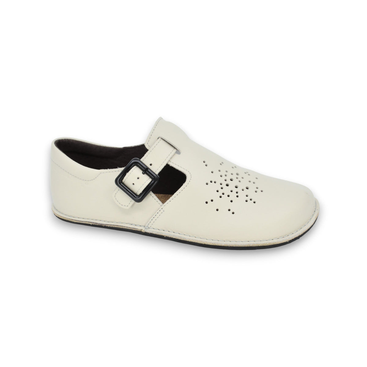4. Side view of Omaking Kuuda Shoes in white, highlighting soft leather upper and non-slip outsole