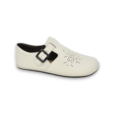 4. Side view of Omaking Kuuda Shoes in white, highlighting soft leather upper and non-slip outsole