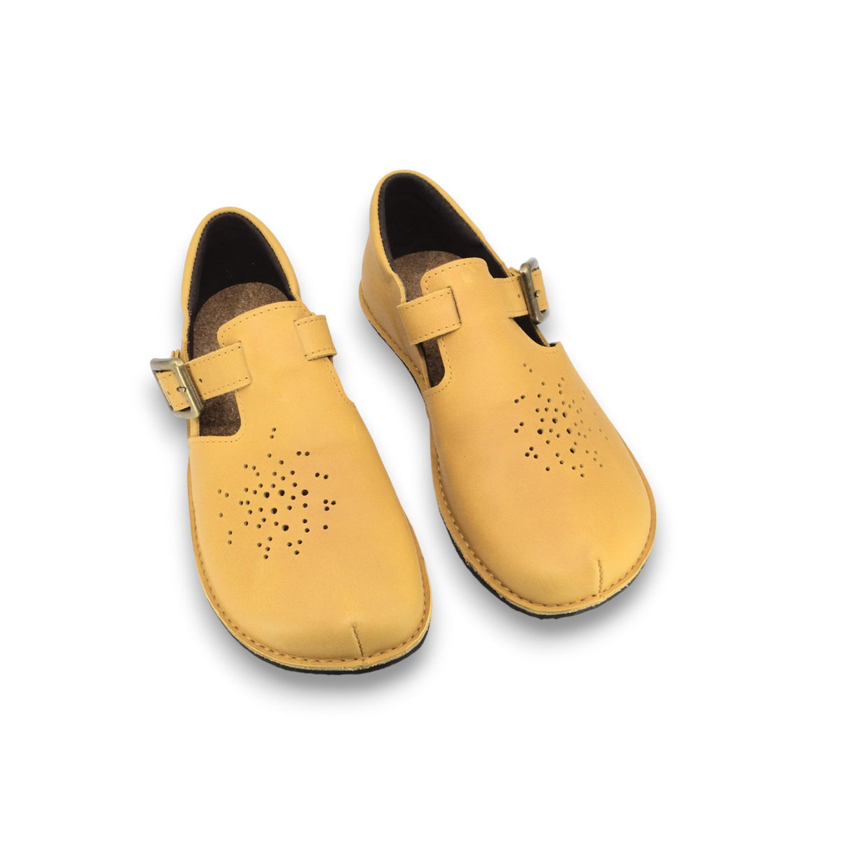 2. Pair of Omaking Kuuda Shoes in yellow, shown from above highlighting perforated design and flexible sole