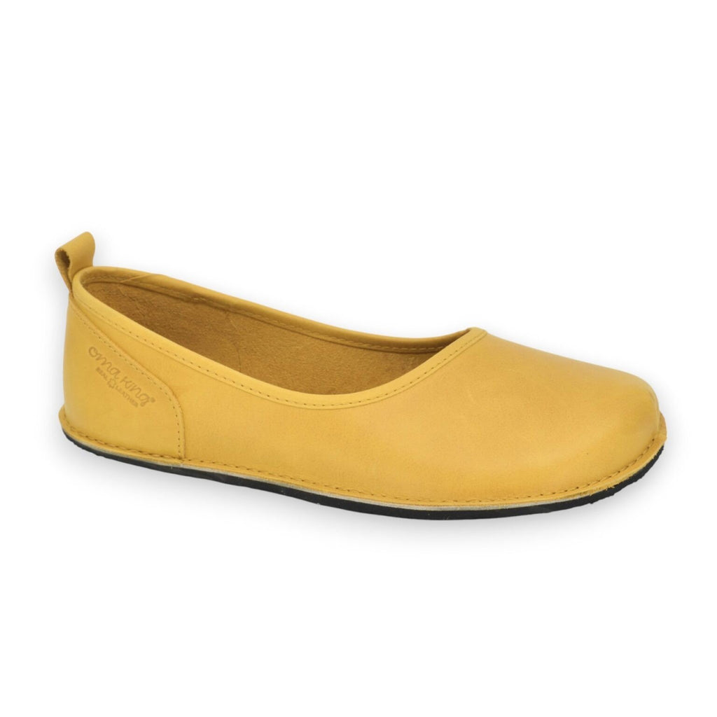 1. Women's Kuutsid Shoes Wide in vibrant yellow, featuring a soft genuine leather upper and lightweight EVA rubber outsole, shown in a studio setting
