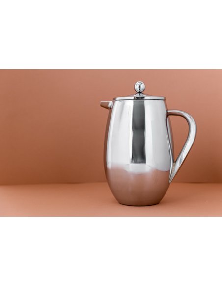 5. La Cafetière silver coffee maker on peach background showing side profile