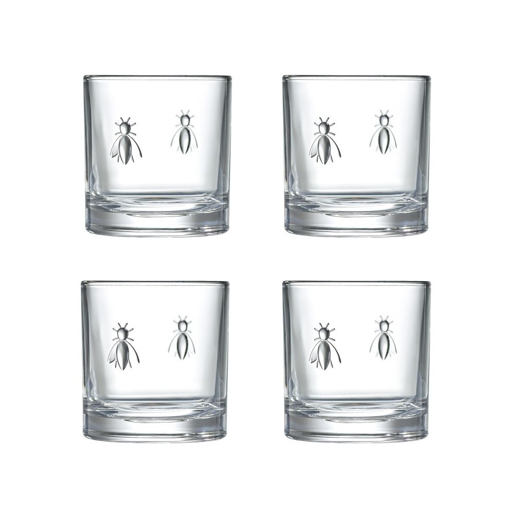 2. Set of four La Rochère Bee Whiskey Glasses with embossed bee design on a white background, showcasing the unique and playful style
