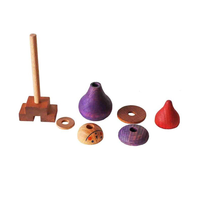 4. Flat lay of LALA Stick Figure Puzzle pieces in purple and red on white background