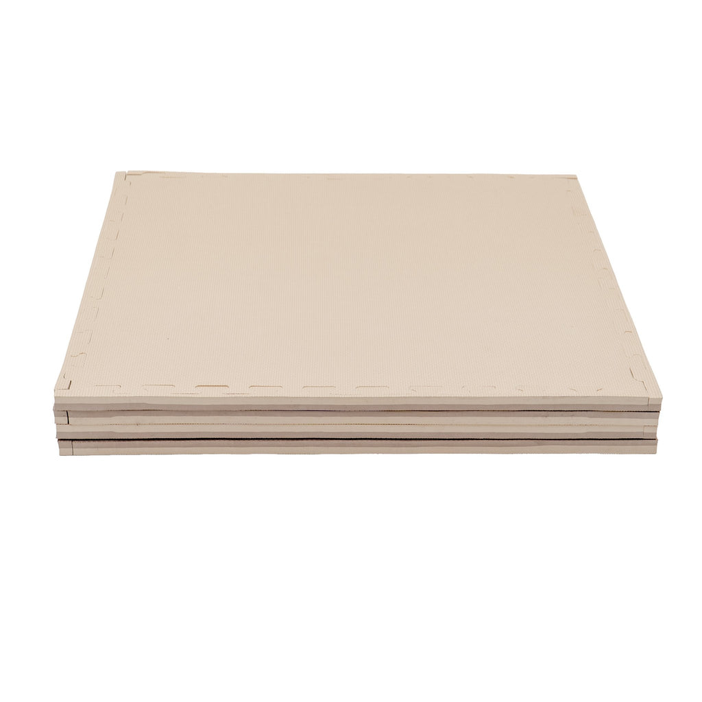 8. Stack of beige foam puzzle mats showing thickness and clean edges