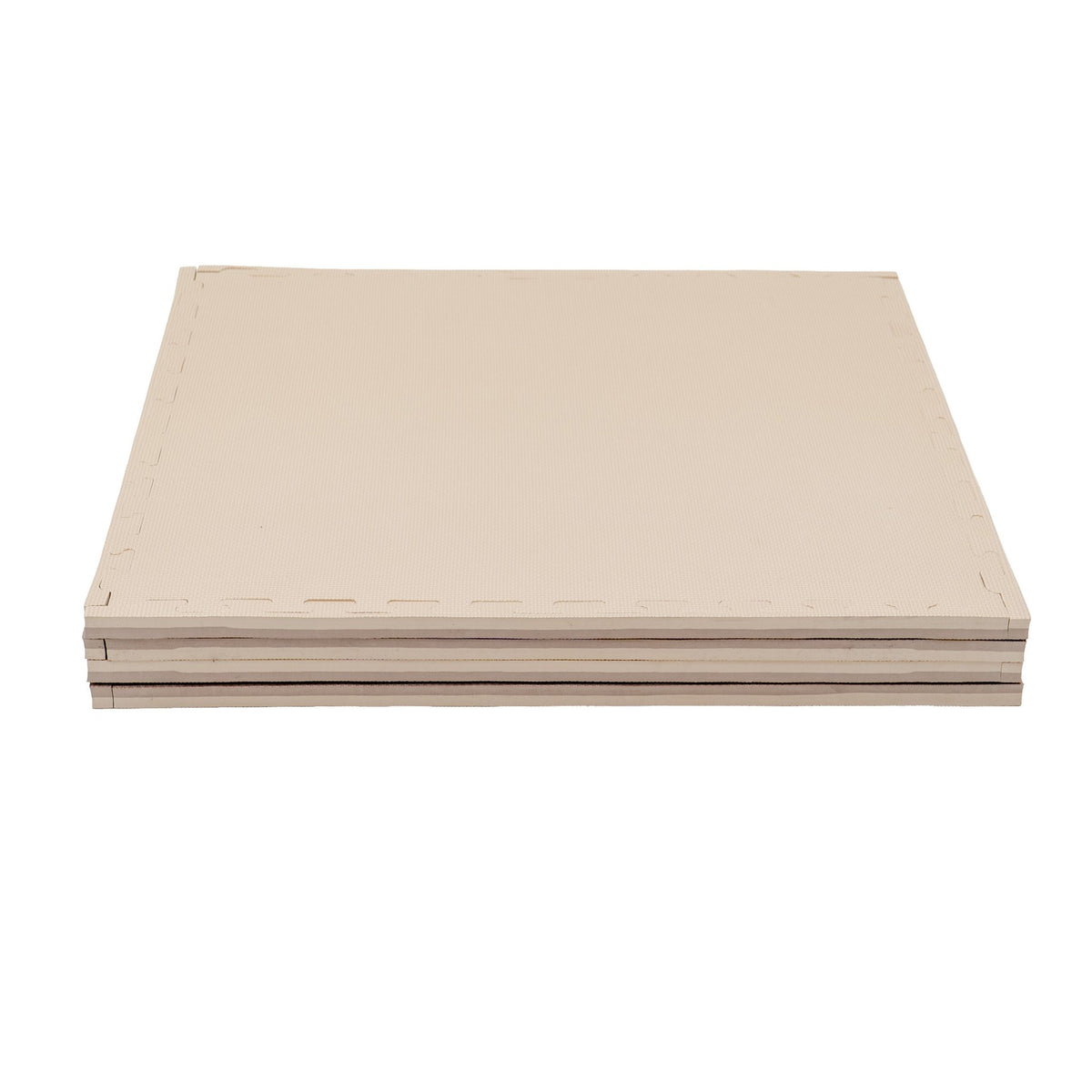 8. Stack of beige foam puzzle mats showing thickness and clean edges