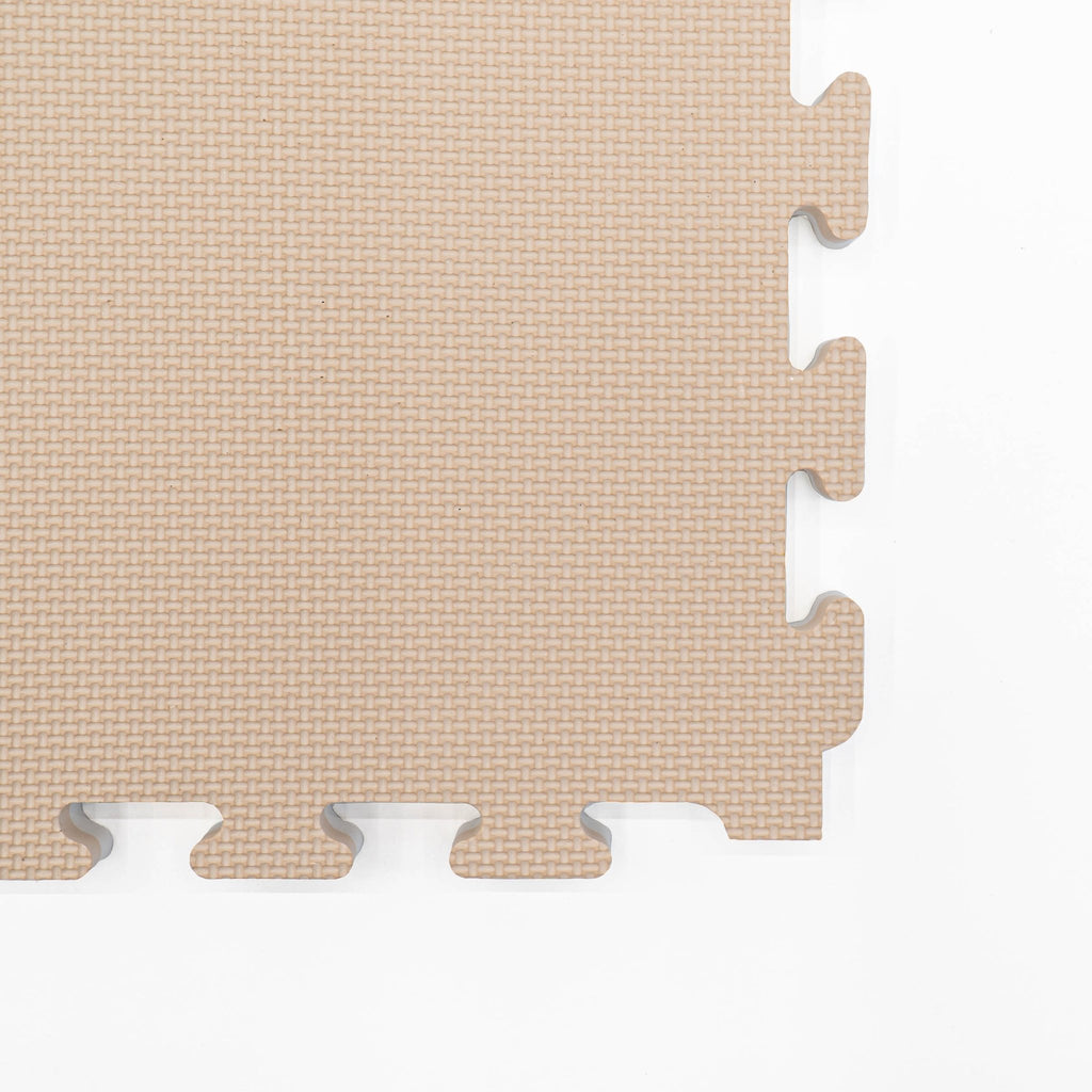4. Close-up of beige foam puzzle mat showing interlocking edge detail