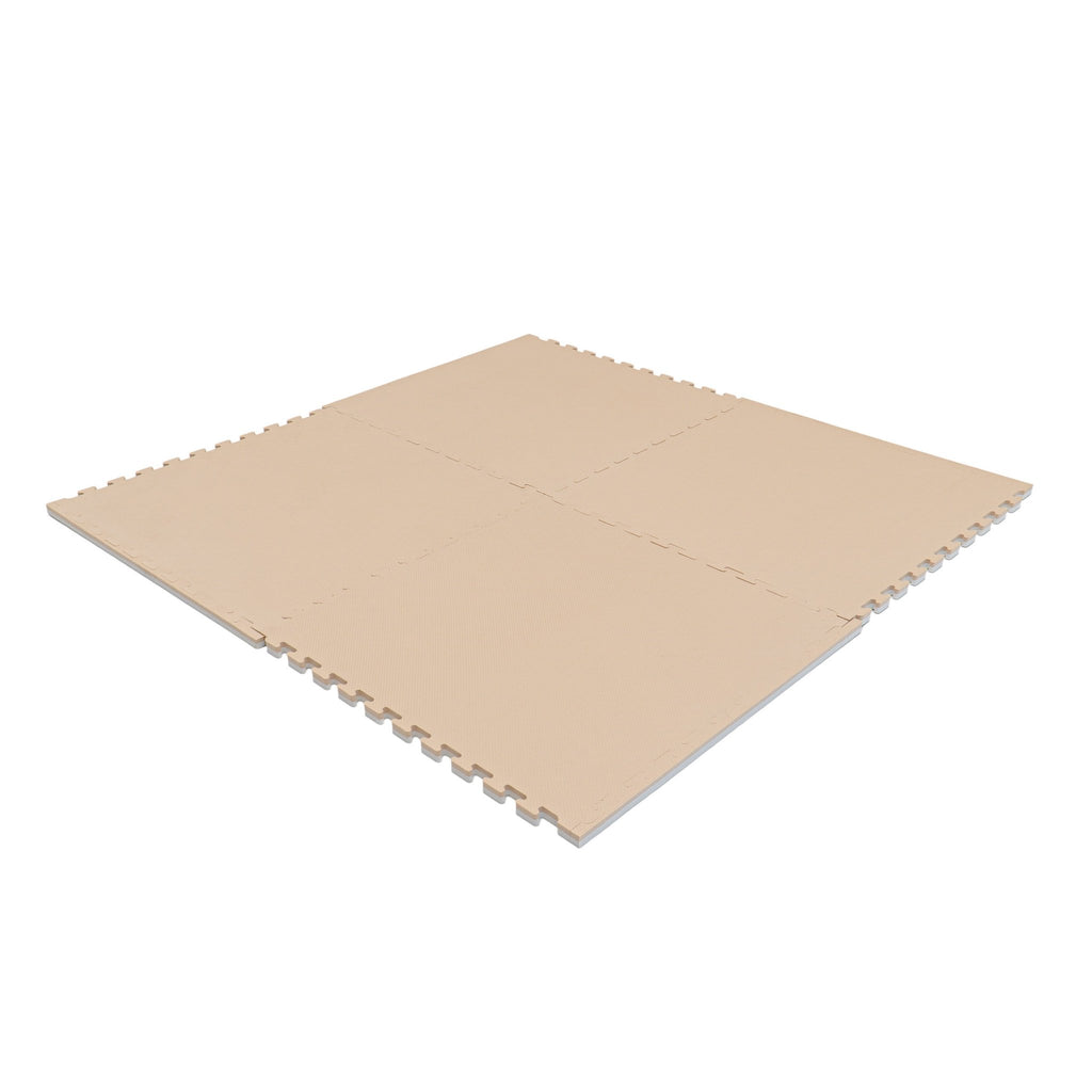 12. Beige foam puzzle mats connected to form a large square on a white background