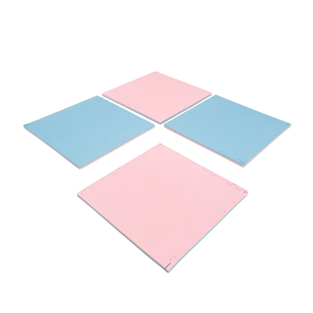 2. Set of four large foam puzzle mats in baby pink and baby blue arranged in a square pattern