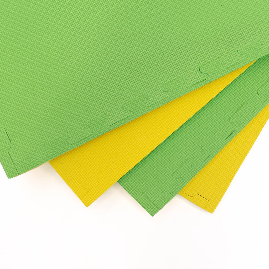 4. Three IGLU foam puzzle mats in spring green and yellow stacked showing texture and color contrast