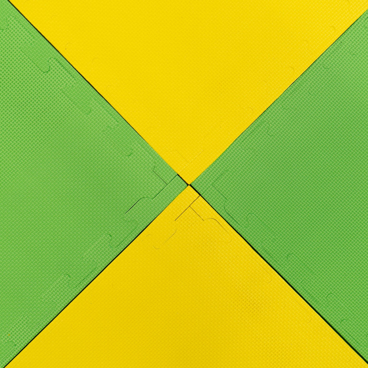 4. Overhead view of IGLU foam puzzle mats in alternating spring green and yellow pattern