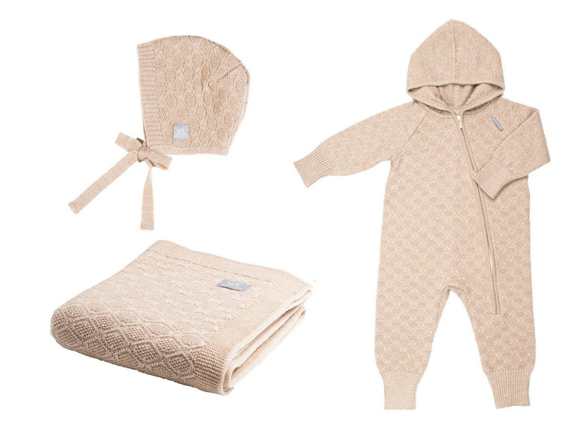 2. Beige merino wool baby gift set including blanket, romper, and bonnet on white background