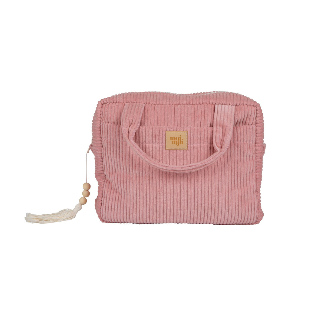 2. Studio shot of Moi Mili large baby pink makeup bag with ribbed texture and tassel detail