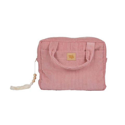 2. Studio shot of Moi Mili large baby pink makeup bag with ribbed texture and tassel detail