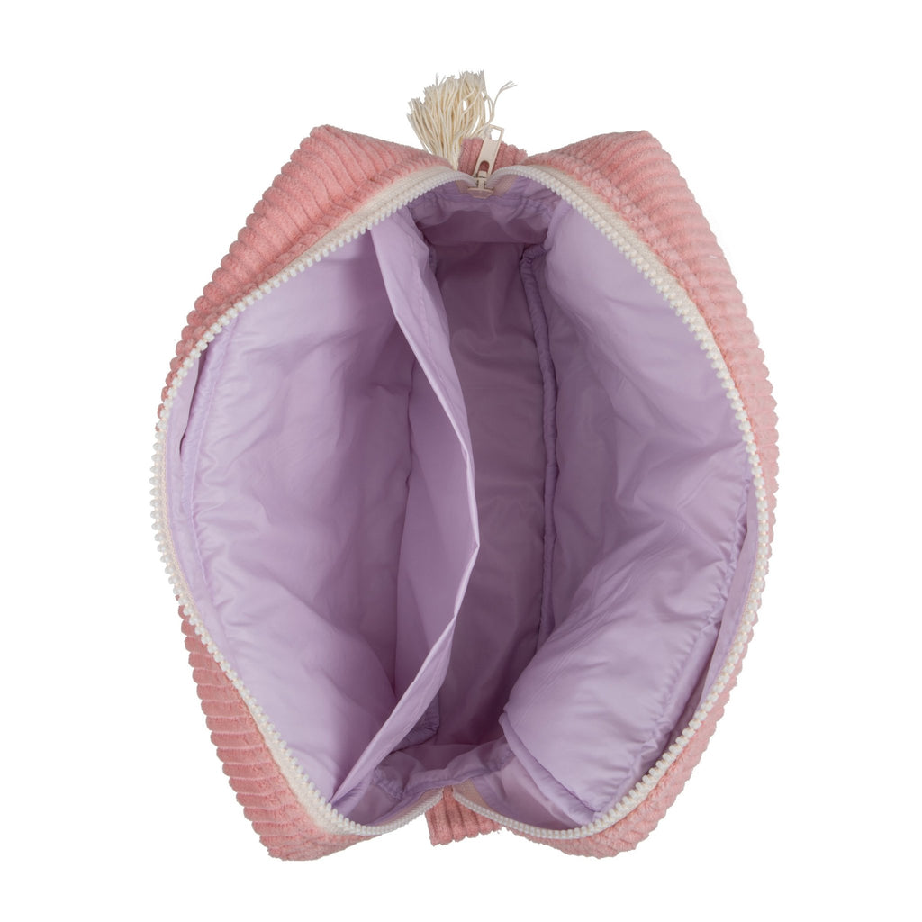 3. Interior view of baby pink makeup bag showing spacious compartments and waterproof lining