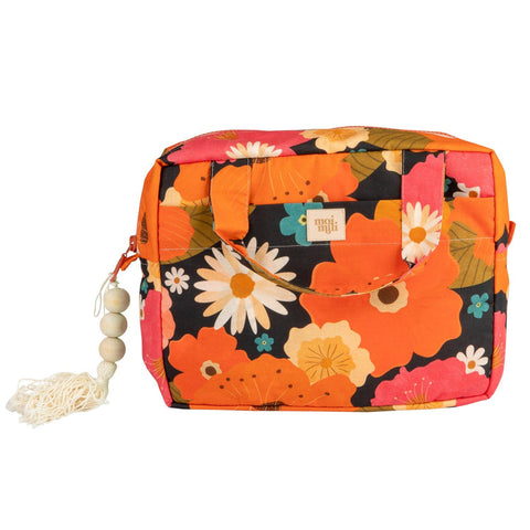 2. Studio shot of large floral print makeup bag with tassel detail