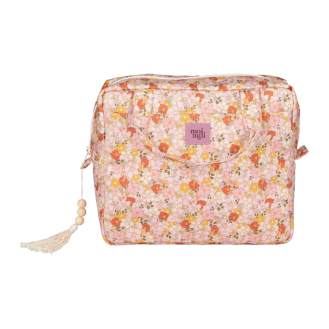 2. Moi Mili large makeup bag with floral print and tassel on white background, showing front logo