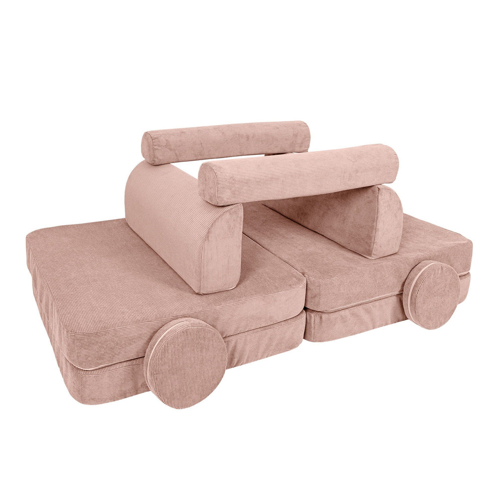 3. Pink modular sofa for kids in slimcord corduroy arranged as a creative structure with cushions