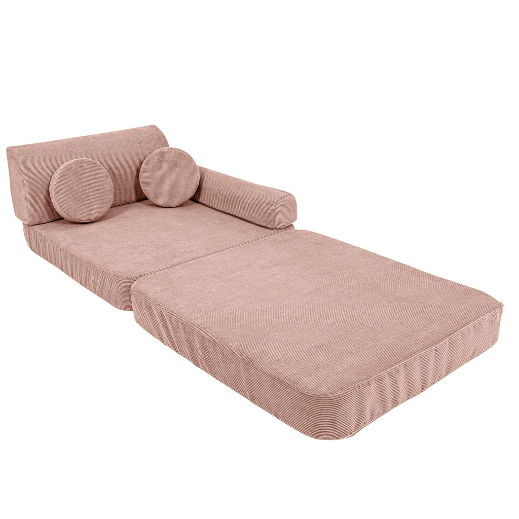 4. Pink modular sofa for kids in slimcord corduroy arranged as a flat bed with cushions