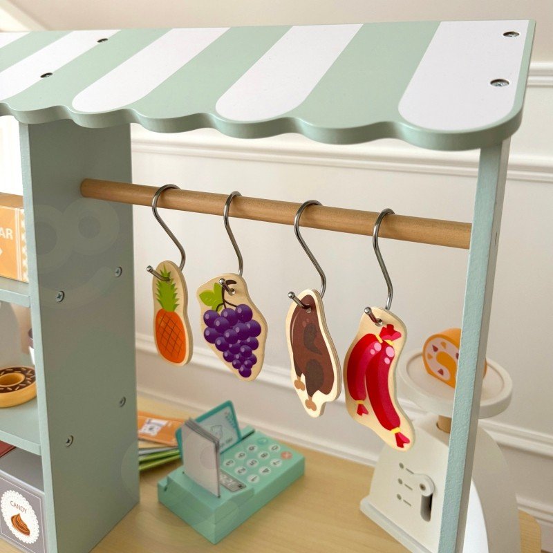 10. Hanging play food items on Woopie Green wooden food truck stand
