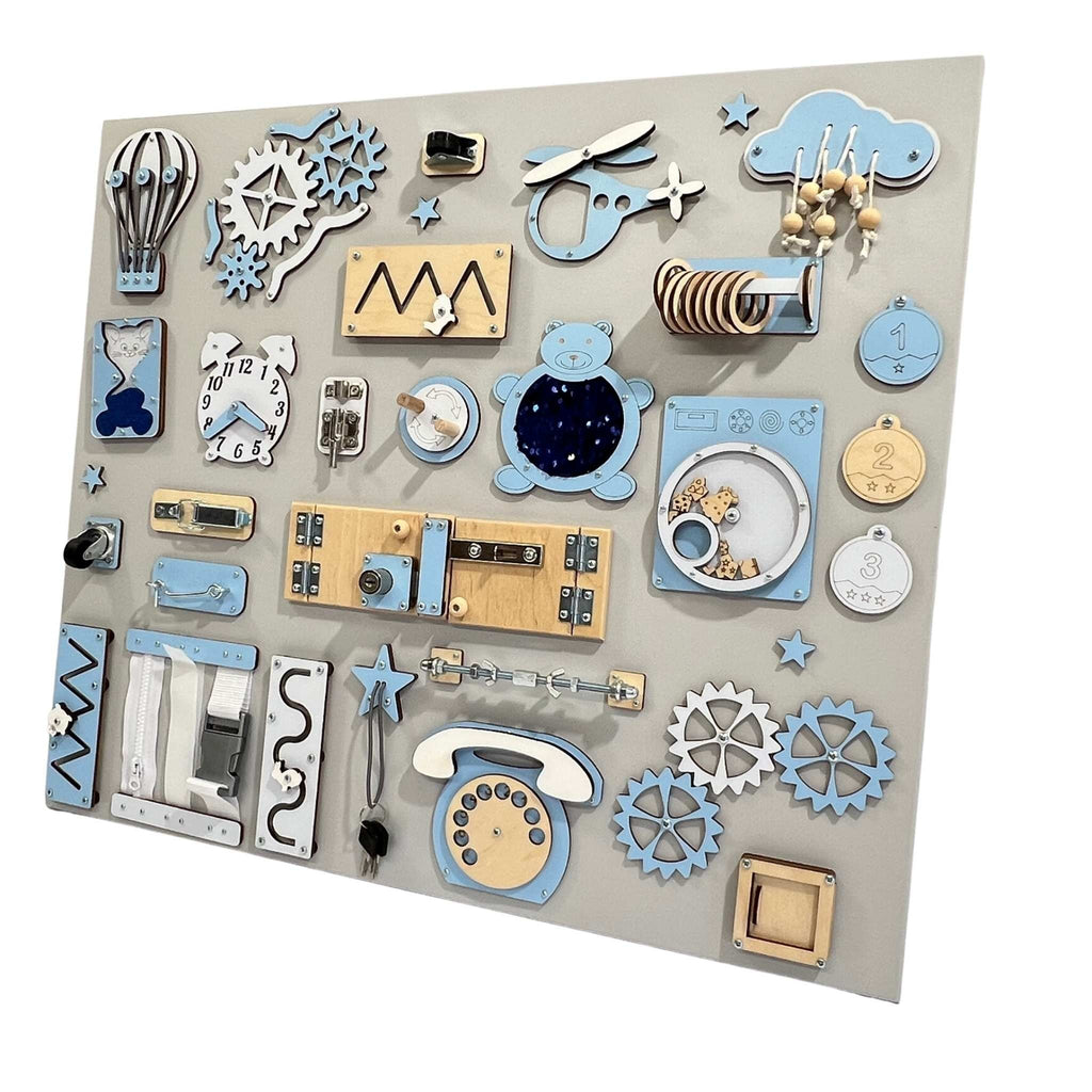 3. Large wall busy board with blue and white elements including gears, locks, and a telephone on a grey background