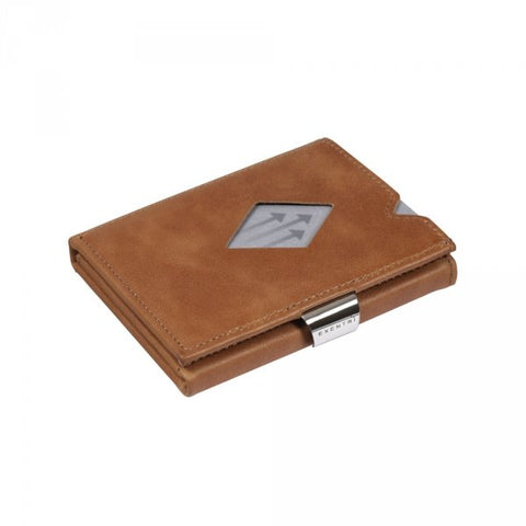 4. Closed brown leather EXENTRI Multiwallet with stainless steel lock and visible card slot