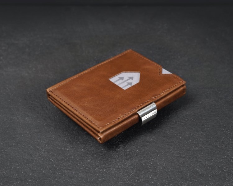12. Hazelnut EXENTRI leather wallet with stainless steel clasp on dark textured surface