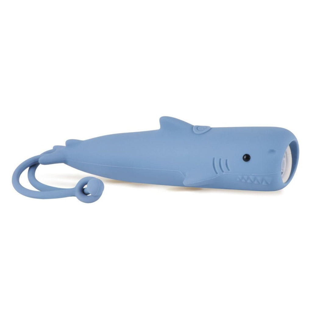 2. Blue shark-shaped flashlight with silicone material and hanger on white background