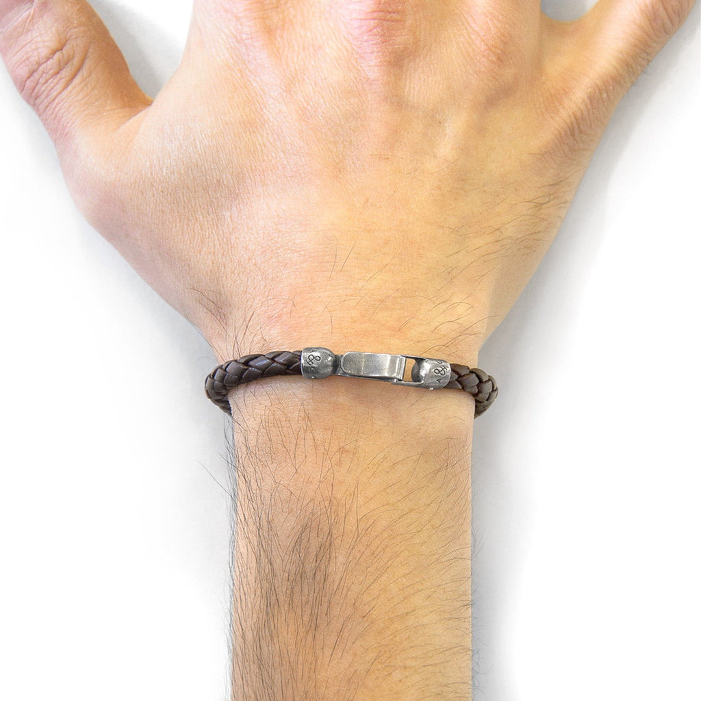 1. Men's cacao brown braided leather bracelet by ANCHOR & CREW, shown on wrist with sterling silver clasp