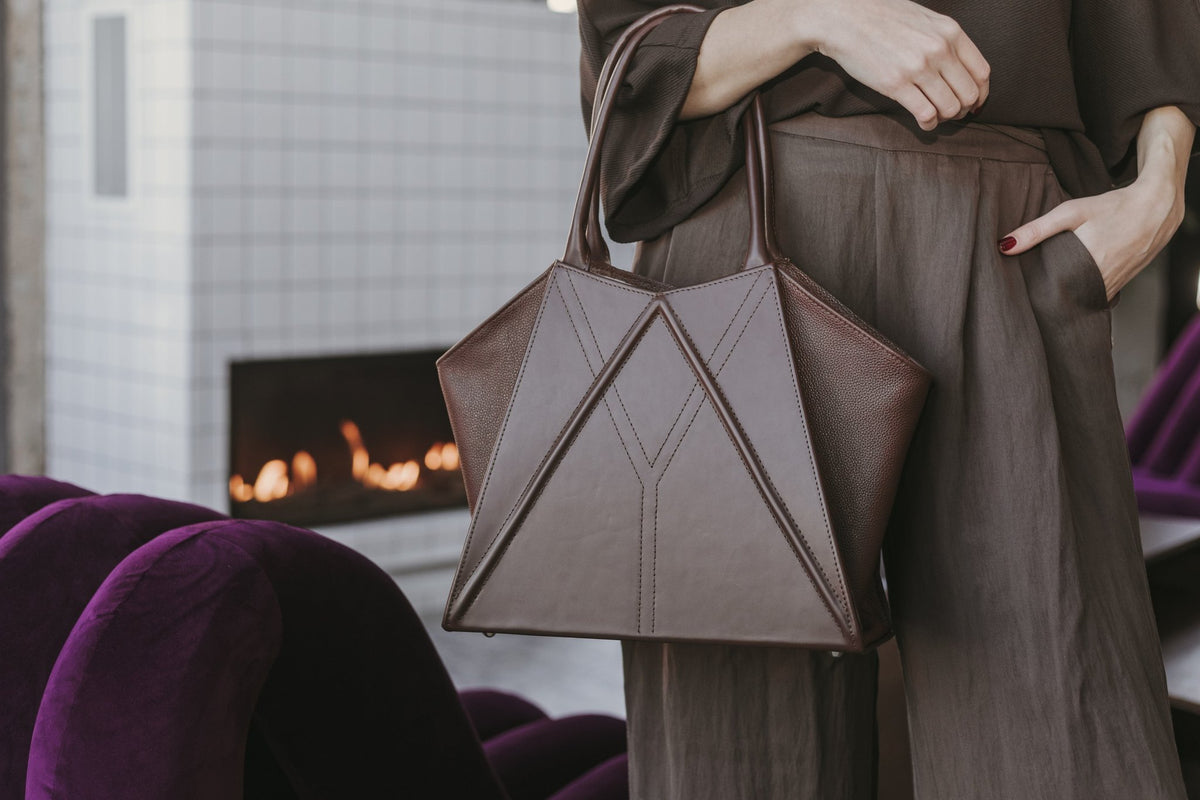 12. Close-up of the handles and top opening of Gerda Retter Design Leather Handbag Nova in caramel brown