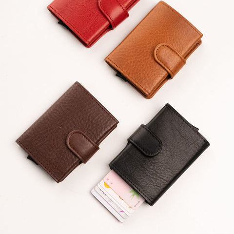 2. Papillon Leather Wallet 40-25 in four colors with cards partially visible, highlighting compact design and card holder