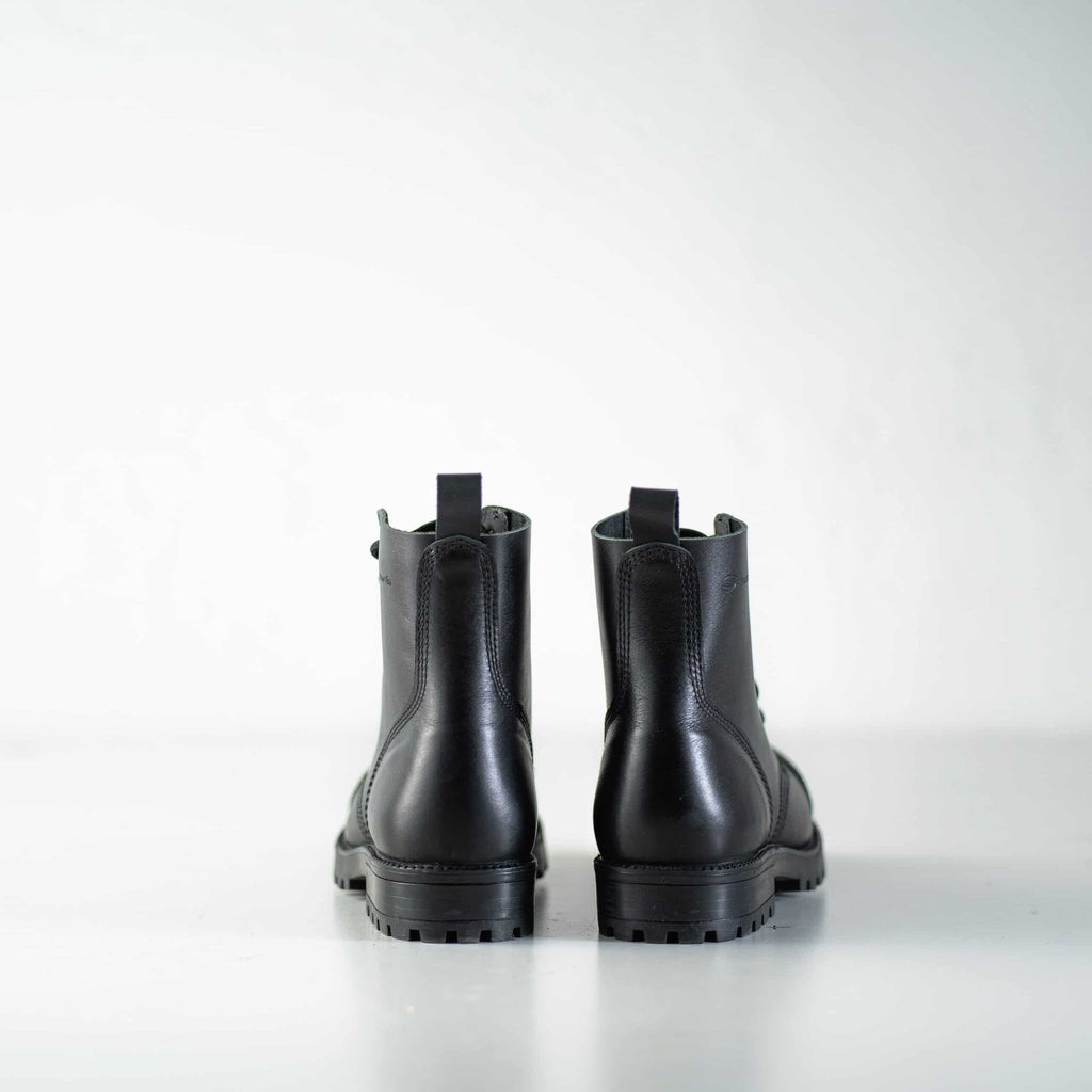 7. Back view of Samelin 517 Aviator Boots in black, studio setting showing heel and sole