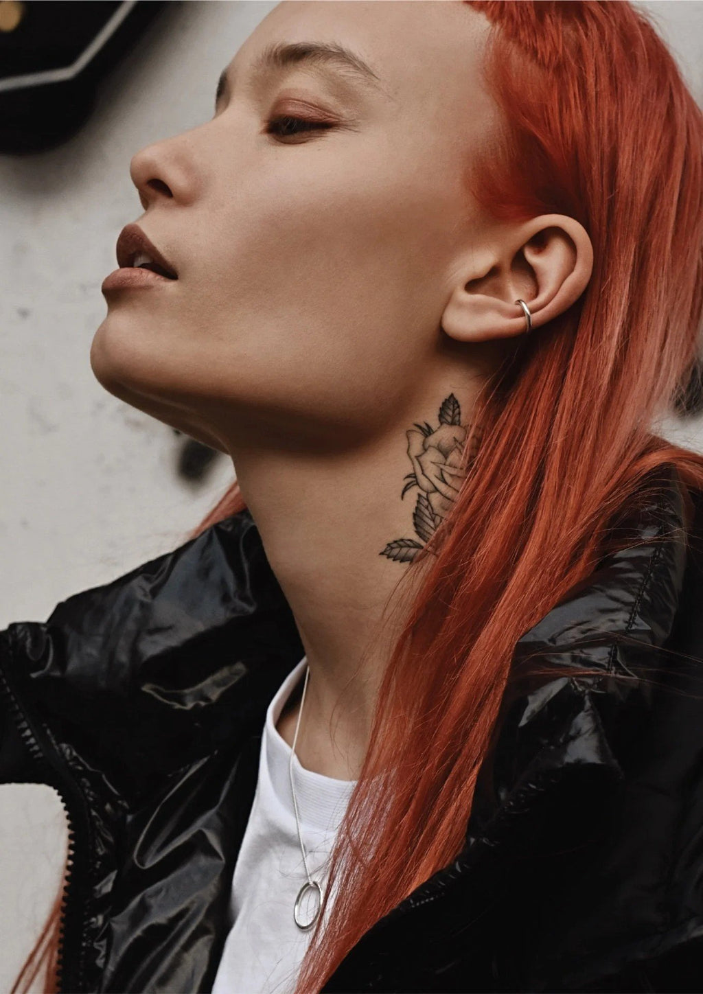 1. Unisex silver Line Ear Cuff by NO MORE worn by female model with red hair, styled with a black jacket