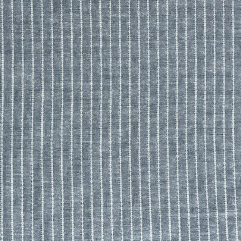 9. Close-up of linen sauna seat cover fabric with vertical light stripes, focusing on texture and mixed fibers.