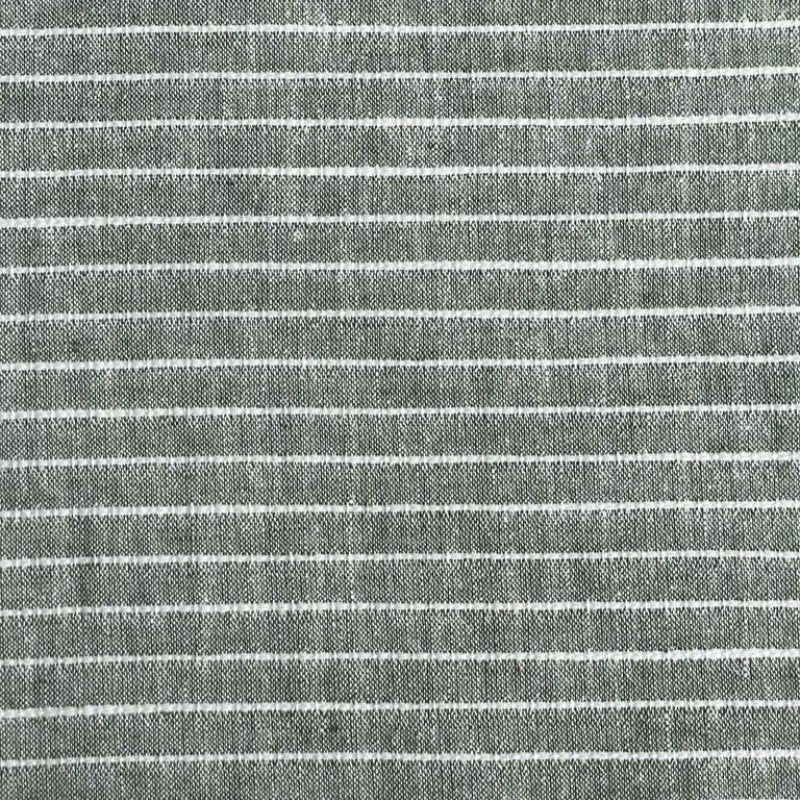 3. Close-up of linen sauna seat cover fabric with horizontal light stripes, emphasizing texture and mixed fibers.