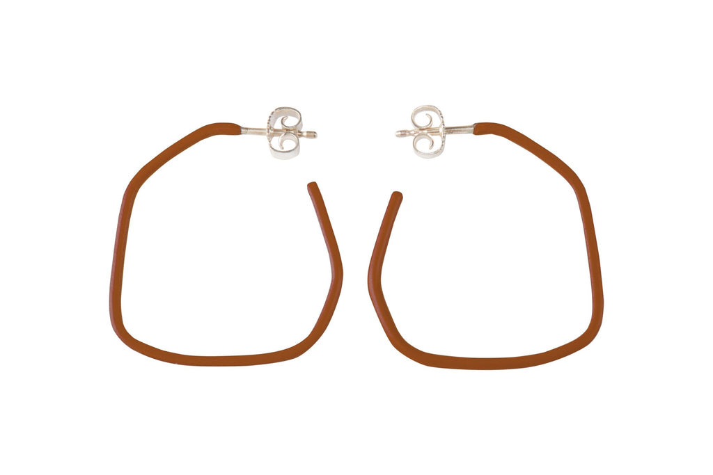 5. Studio image of Lisa Kroeber Jewellery Lines Earrings in brown