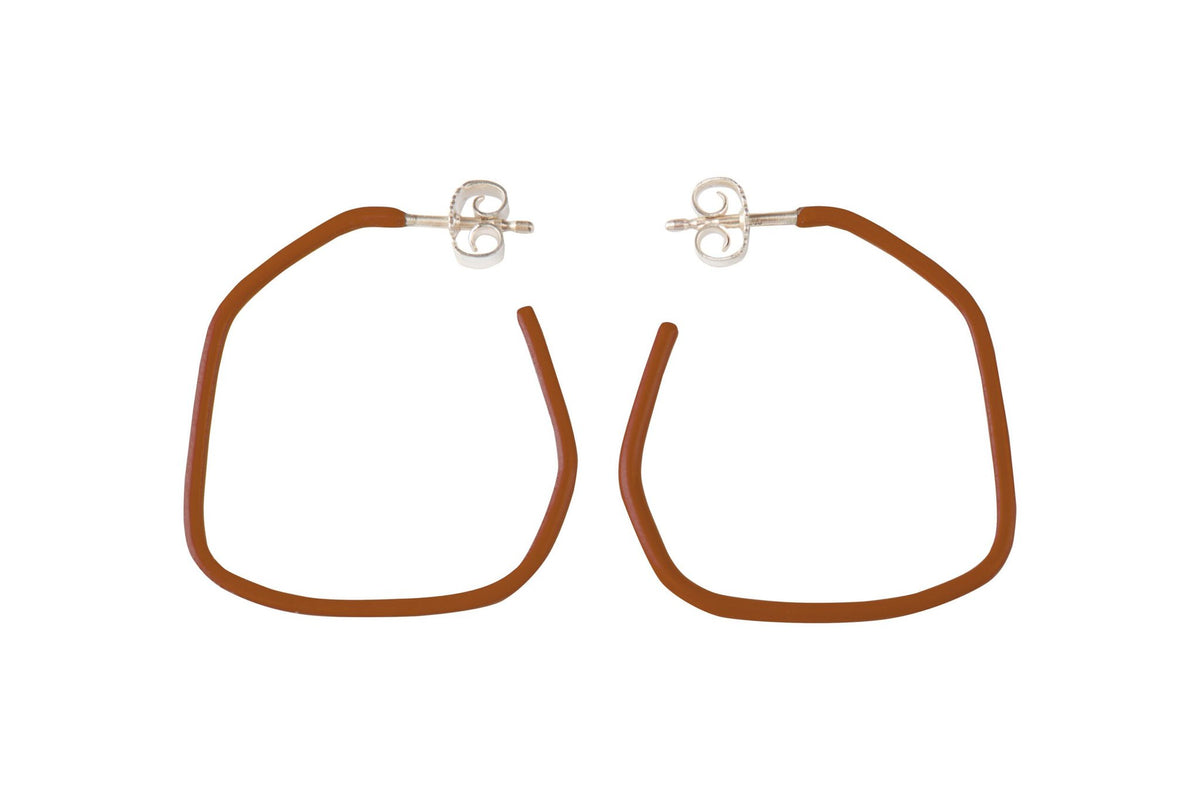 5. Studio image of Lisa Kroeber Jewellery Lines Earrings in brown