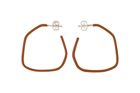 5. Studio image of Lisa Kroeber Jewellery Lines Earrings in brown