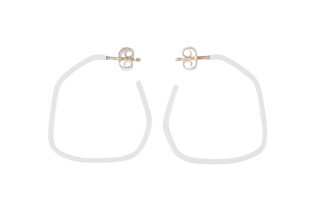 8. Studio image of Lisa Kroeber Jewellery Lines Earrings in white