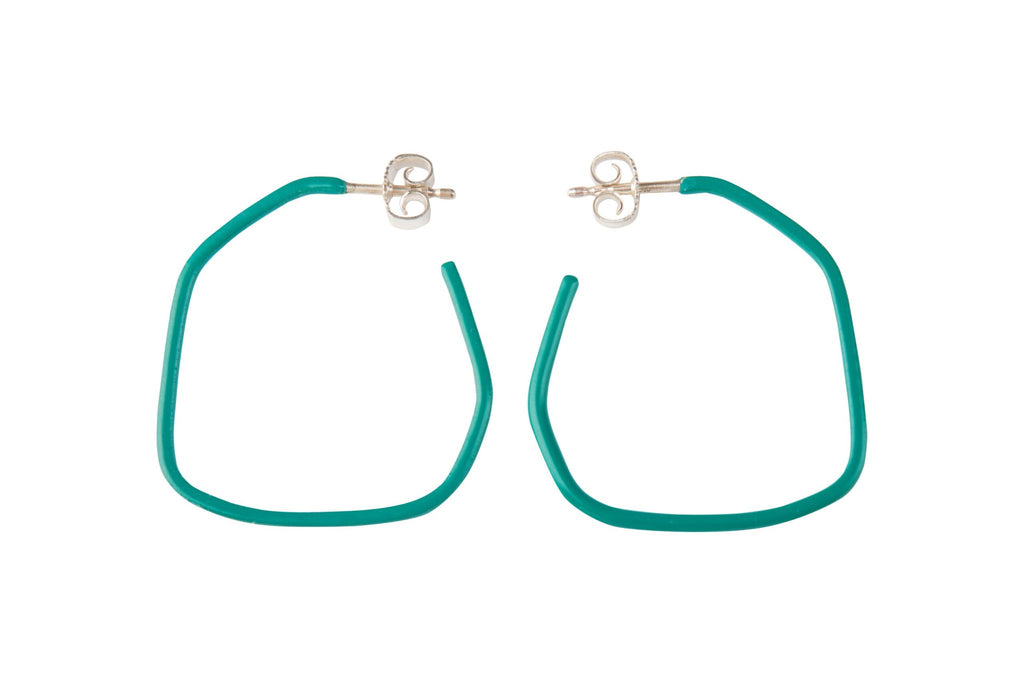 7. Studio image of Lisa Kroeber Jewellery Lines Earrings in teal