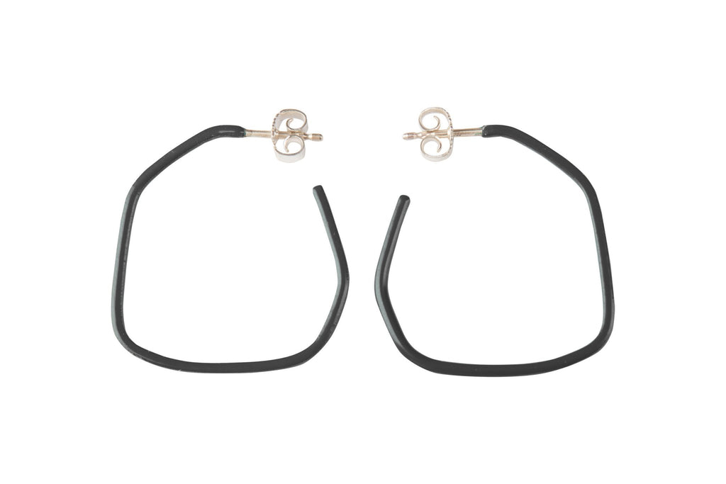13. Studio image of Lisa Kroeber Jewellery Lines Earrings in black