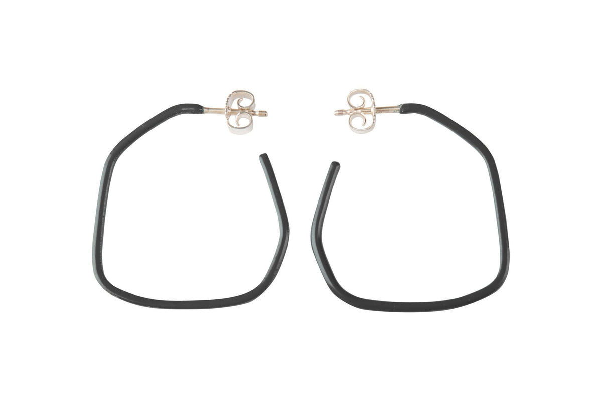 13. Studio image of Lisa Kroeber Jewellery Lines Earrings in black