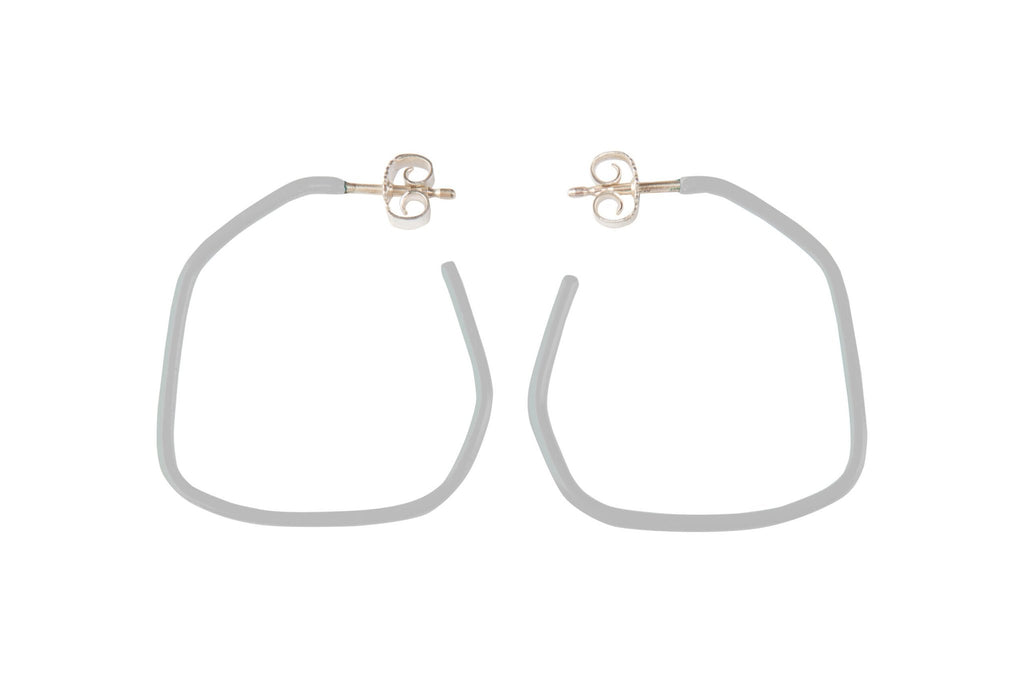 9. Studio image of Lisa Kroeber Jewellery Lines Earrings in grey