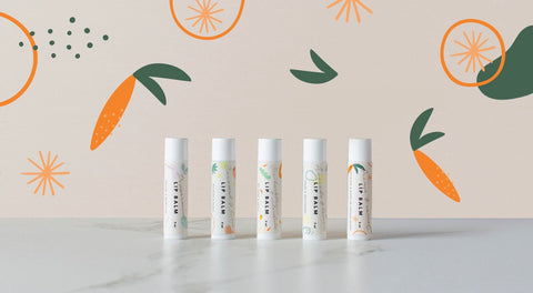1. Five BONOBO lip balm tubes with various flavors including avocado lemon, displayed on a marble surface with colorful fruit illustrations in the background