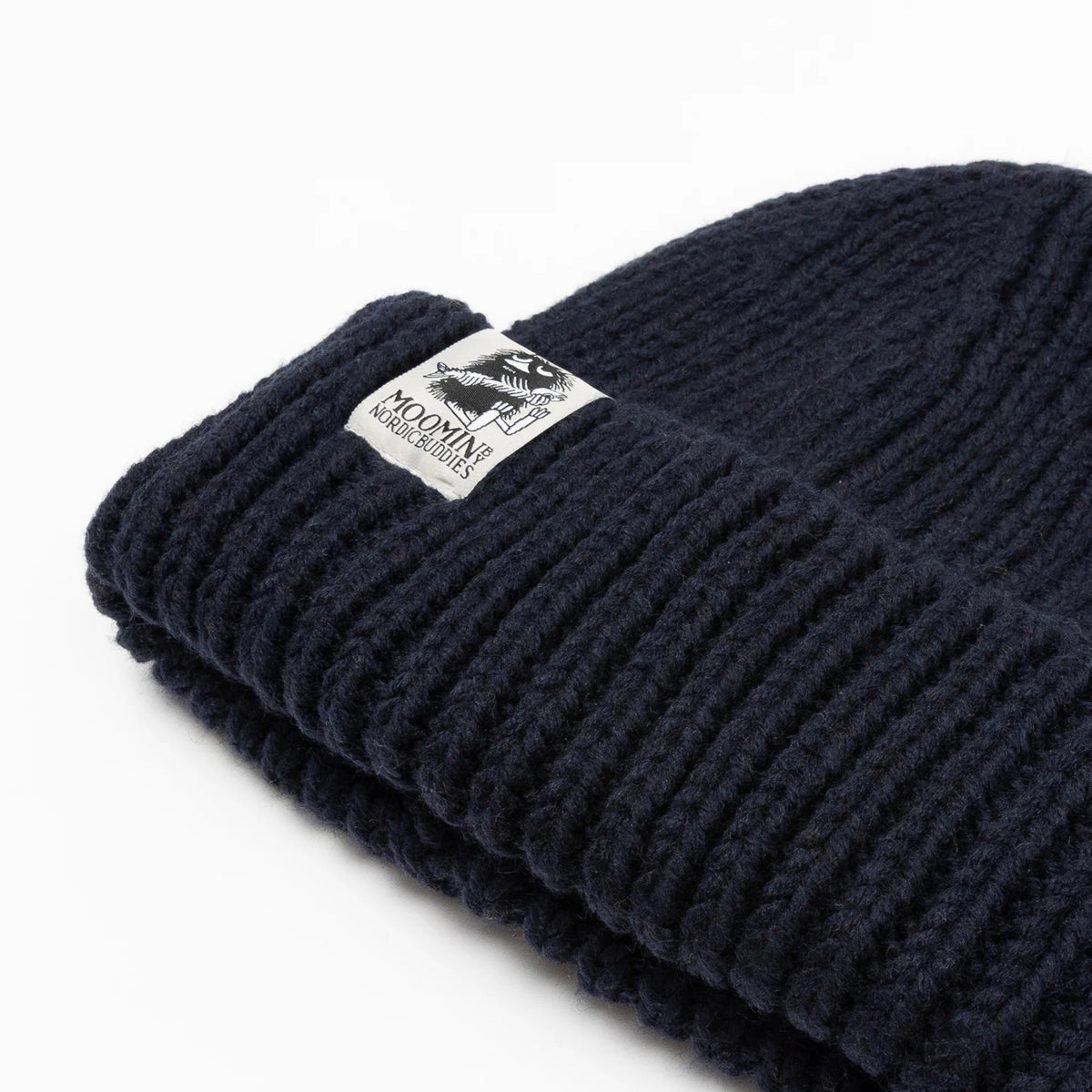 2. Close-up of navy chunky beanie highlighting Moomin by NordicBuddies logo on folded brim