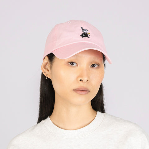 1. Woman wearing Little My Dad Cap in pink by Moomin, front view in studio