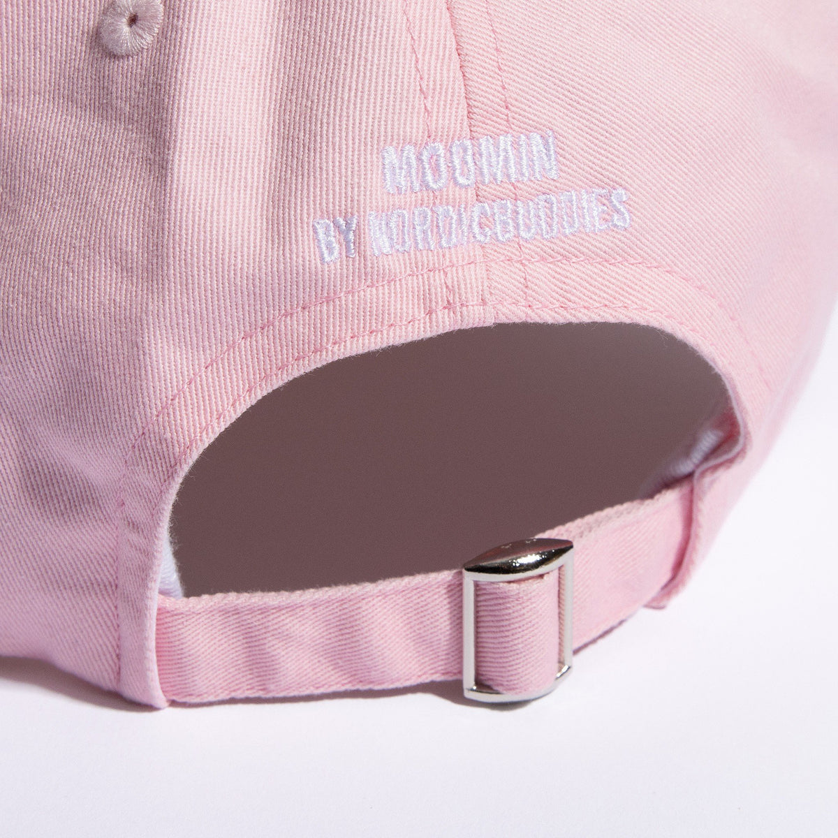 4. Back view of pink Moomin Dad Cap showing adjustable strap and branding