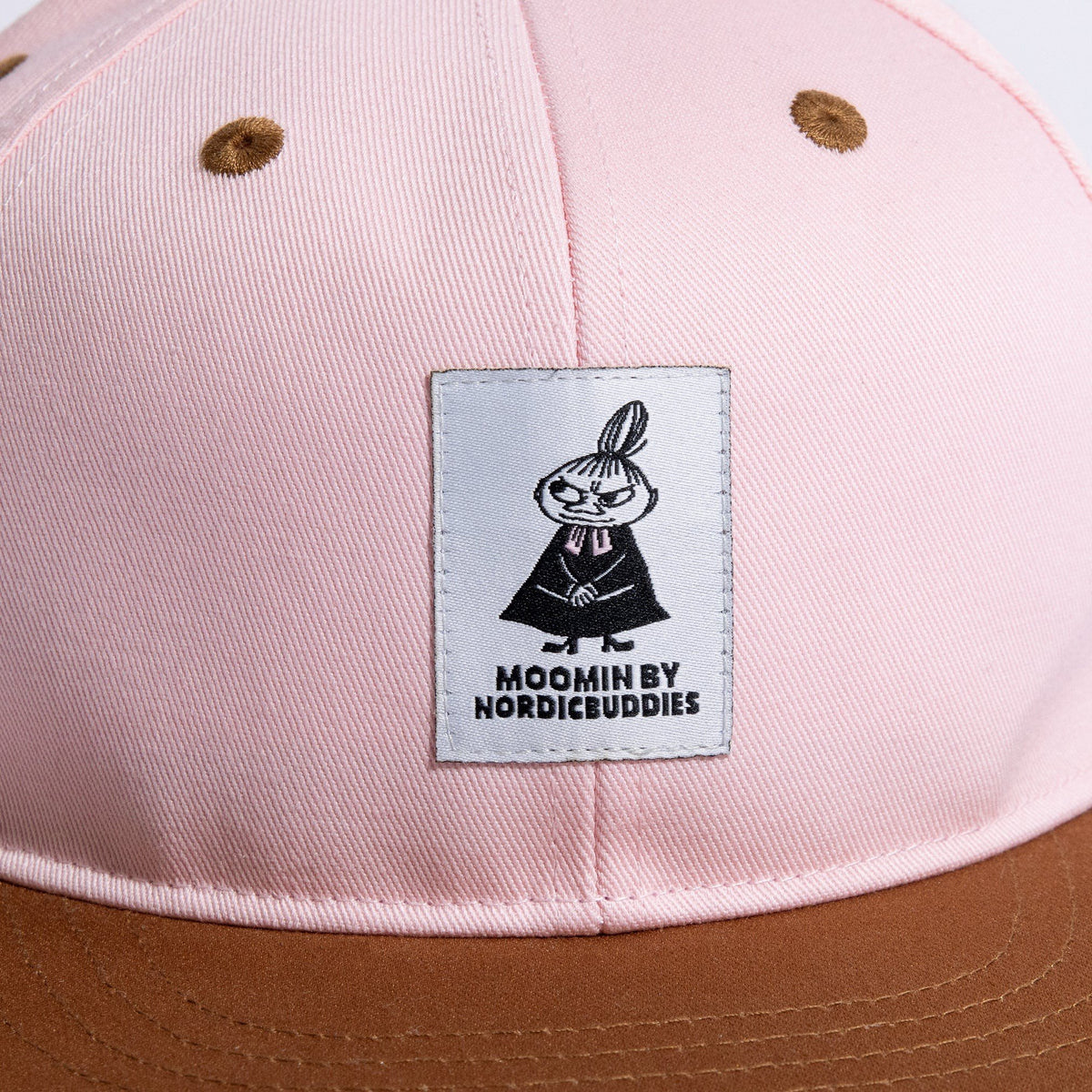 2. Close-up of Little My logo on kids' pink and brown flat cap by Moomin