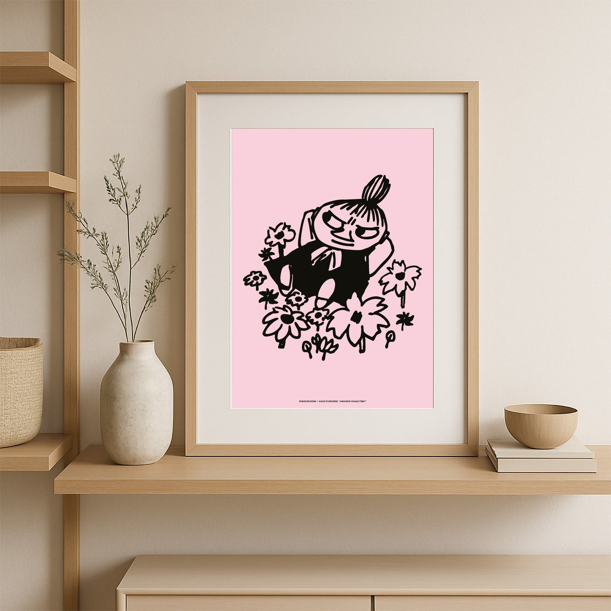 1. Little My Poster by Moomin in wooden frame on shelf, pink background, 30x40 cm